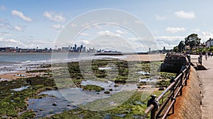 Liverpool skyline over the rockpools