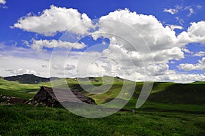 A livestock settlement in the mountainous areas where cattle breeders prepare dairy products during the summer, especially cheese.