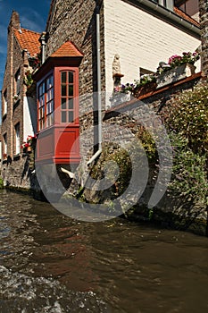 Living along the  canal on a sunny summers  day in Bruges Belgum