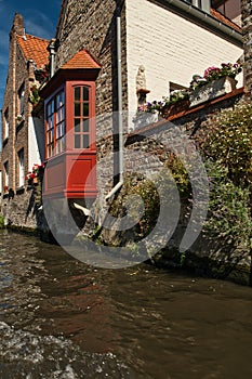 Living along the  canal on a sunny summers  day in Bruges Belgum photo