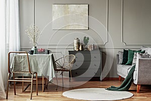 Living and dining room interior with green and grey design