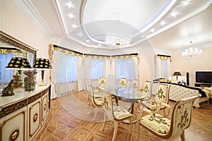 Living and dining room with luxury gilt furniture