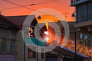 Living district poor houses in evening time with sun ray orange lighting vivid colors