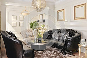 Living room with black leather sofa