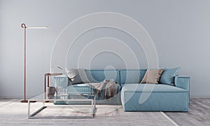 Living room with blue sofa, glass table and copper floor lamp