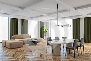 Living room with brown and grey furniture, chairs and sofa and big windows