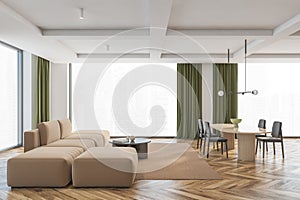 Living room with brown and grey furniture, chairs and sofa and big windows