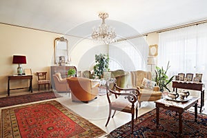 Living room, classic italian interior with antiquities photo