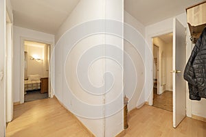 Living room corridors with oak flooring and smooth white painted walls