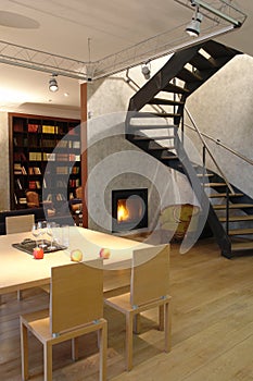 living room with fireplace and stair