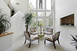 Living room with floor to ceiling windows