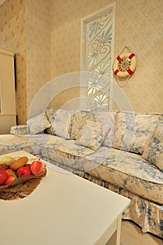 Living room with flowery sofa