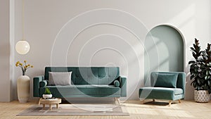 Living room with green armchair and green sofa on empty white wall background