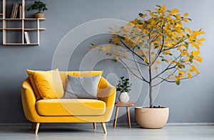 living room and home office with yellow chair, blue couch and grey tree