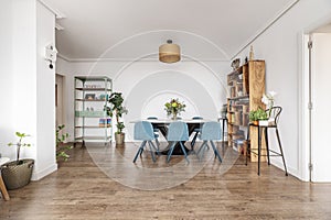 Living room of a house with wooden floors, metallic industrial style