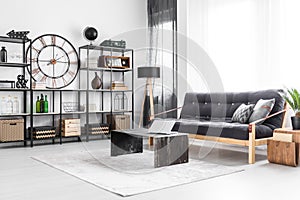 Living room with industrial clock