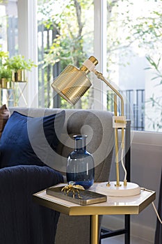 Living room interior with yellow , blue and pink pillows on sofa