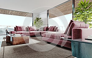 Living room with a large pink sofa and a TV unit with shelves and decor. Living room studio with kitchen and living area. Large