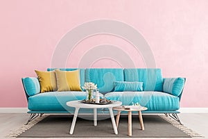Living room millennial pink interior wall mock up with light blue sofa, empty white wall with free space above on top