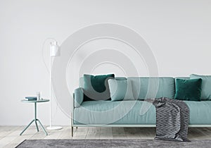 Living room with a mint sofa and table