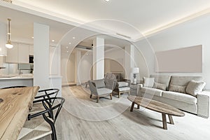 Living room with oval unvarnished wooden table on wooden floors, balcony