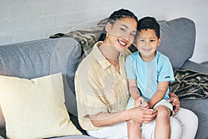 Living room portrait, relax and happy mother, child and smile for motherhood, childhood and family love bond, support or