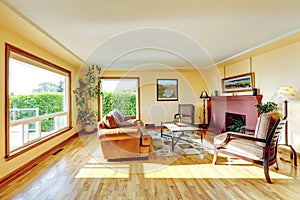 Living room with red brick fireplace