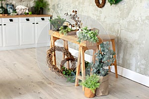 Living room in rustic style in summer. Flowers shop. Interior workplace florist.