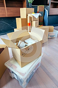 Living room with stack of moving boxes