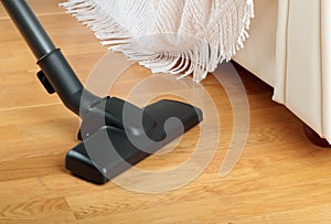 Living room with a vacuum cleaner