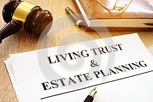 Living trust and estate planning form on desk.