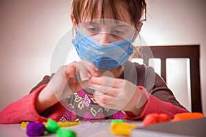 Living under coronavirus quarantine: game and occupation for child at home during quarantine of coronavirus. Ð¡lose up cute little