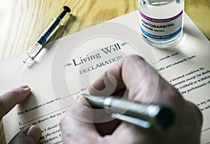 Living will declaration form Next to a vial of pentobarbital sodium to proceed to euthanasia