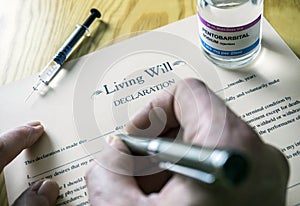 Living will declaration form Next to a vial of pentobarbital sodium to proceed to euthanasia photo