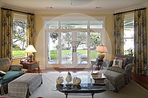 Livingroom with waterfront view photo