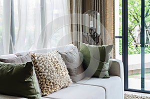 Livingroom with white sofa and modern lamp