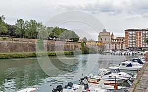 Livorno cityscape with canal and New Fortress, Italy