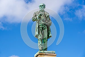 Outdoor bronze statue, monument of Luigi Orlando in Livorno, Tuscany, Italy photo