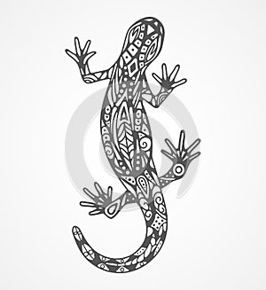 Lizard. Vector drawing with pattern on the body in the style of a tribal tattoo. Curved body position, top view. Black lizard with