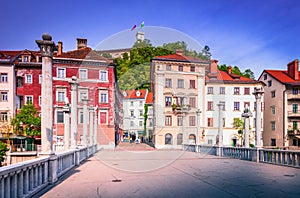 Ljublijana, Slovenia. Cobblers\' Bridge, picturesque pedestrian bridge and view of the Castle
