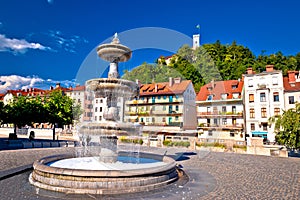 Ljubljana fountain and castle colorful view photo