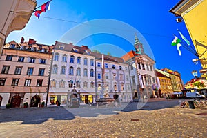 Ljubljana old town cobbled street and city hall view