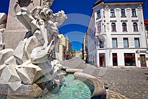 Ljubljana square fountain and street view photo