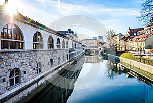 Ljubljanica river with old central market and Triple bridge, Ljubljana.