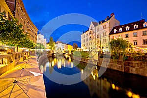 Ljubljanica river waterfront in Ljubljana evening view photo