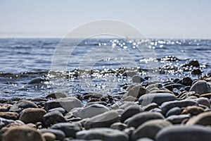 Llanbedrog, North Wales, the UK - the stones on the beach.