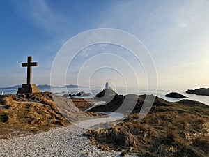 Llanddwyn Island Cross and lighthouse