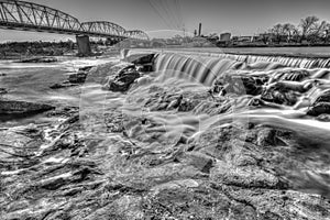 Llano River dam at Badu Park in Texas, black and white artistic mode