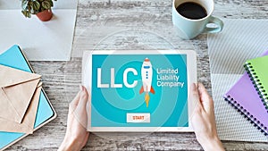 LLC Limited Liability Company. Business strategy and technology concept. photo
