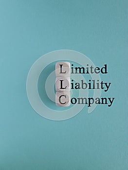 LLC - Limited Liability Company is a business structure that protects its owners from personal responsibility for its debts or